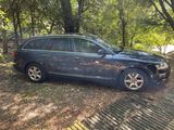 a picture of a car that is parked on the side of the road