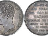 a close up of a coin with a woman ' s face on it