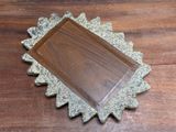 a picture of a wooden tray on a wooden table
