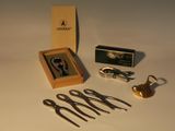 a box with scissors and other items on a table