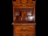 an image of a wooden dresser with a drawer underneath it