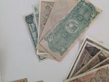 many different types of currency on the table