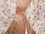 an image of a woman ' s jacket with a bow tie