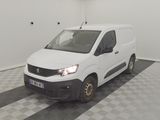 a white van that is parked in a room