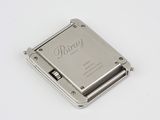the back cover of a silver hard drive on a white surface