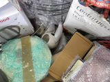 a pile of assorted items in a box