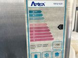 a label on the side of a stainless steel refrigerator