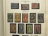 an open book with a bunch of different stamps on it