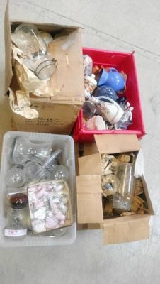 boxes filled with assorted items sitting on the floor
