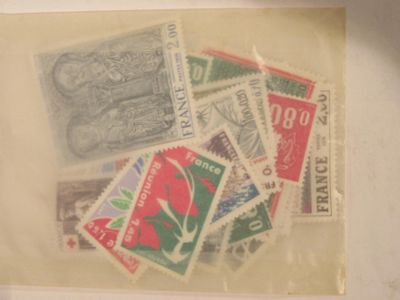 many different stamps in a clear bag on a table