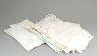 a pile of white lace on top of a table