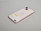 a close up of a cell phone on a table