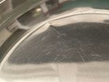 a close up of a metal pan with a handle
