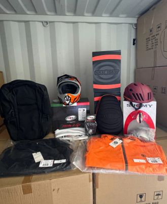 a box with a helmet, helmet, and other items on it