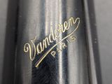 an image of a close up of a metal object with writing on it