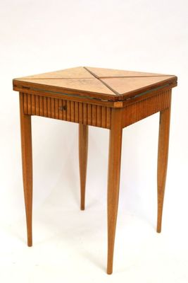 an image of a small table with a wooden top