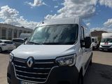 a white van that is parked in a parking lot