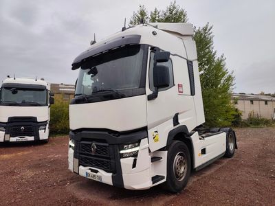 two trucks that are parked next to each other