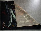 two pieces of cloth on the floor next to each other