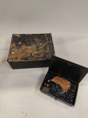a small box that has some kind of jewelry inside of it