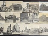 de nombreuses photos de bâtiments anciens posées sur la table