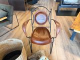 a chair that is sitting on a wooden floor