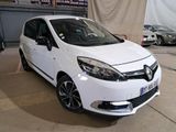 a picture of a white car parked in a garage