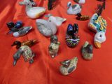 a lot of birds that are sitting on a table
