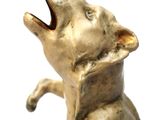 a statue of a dog with its mouth open