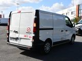 a white van that is parked in a parking lot
