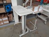 an image of a desk with a sink in a warehouse