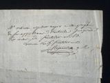 a close up of a piece of paper with writing on it