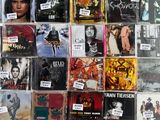 a wall full of cds and cds on the wall