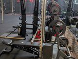 an image of a gym room with equipment in it