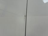 a picture of a white van with a broken door