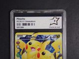the pokemon card is in a clear plastic holder on a table
