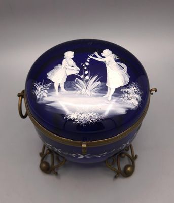 a picture of a blue and white box with a picture of two people on it