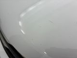 a close up of a car ' s hood with the hood down