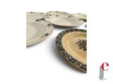 a lot of plates that are sitting on a table