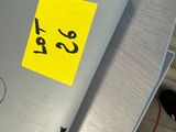 a yellow sticker on the back of a laptop computer