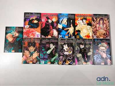 the covers of anime books are lined up on a white surface