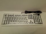 a computer keyboard and mouse sitting on a table