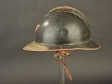 a helmet on a stand on a gray background