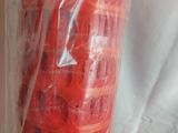 a plastic bag of oranges that are wrapped in plastic