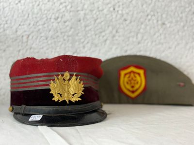two hats that are sitting on top of a table