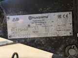 a close up of a motorcycle with a number plate on it