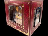 a red box with a picture of a pokemon figure inside of it