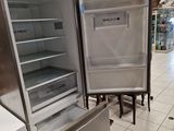 two open refrigerators that are on display in a store