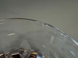a close up of a glass of water on a table