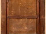 an old wooden window with a rope hanging from it ' s side
